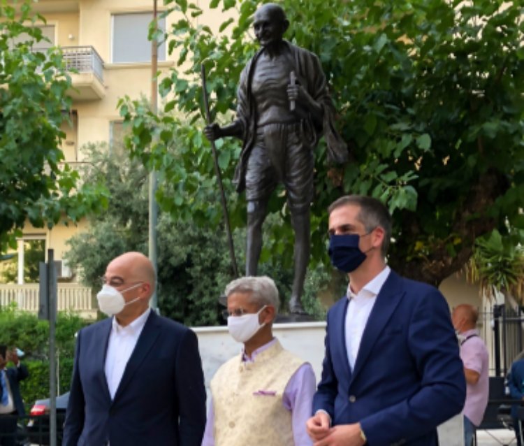 Dr S Jaishankar and his Greece counterpart in front of the statue of Mahatma Gandhi in Athens