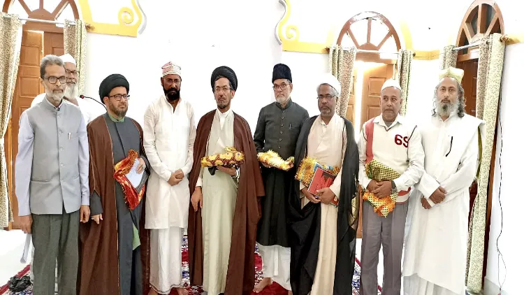 Iranian leader Maulana Syed Alizada being welcomed