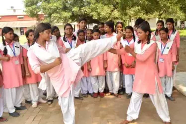 Girls learning self-defence