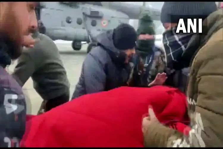 A pregnant woman being airlifted from Kupwara