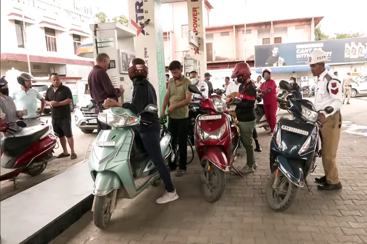 Long queues in front of a pertol station in Imphal