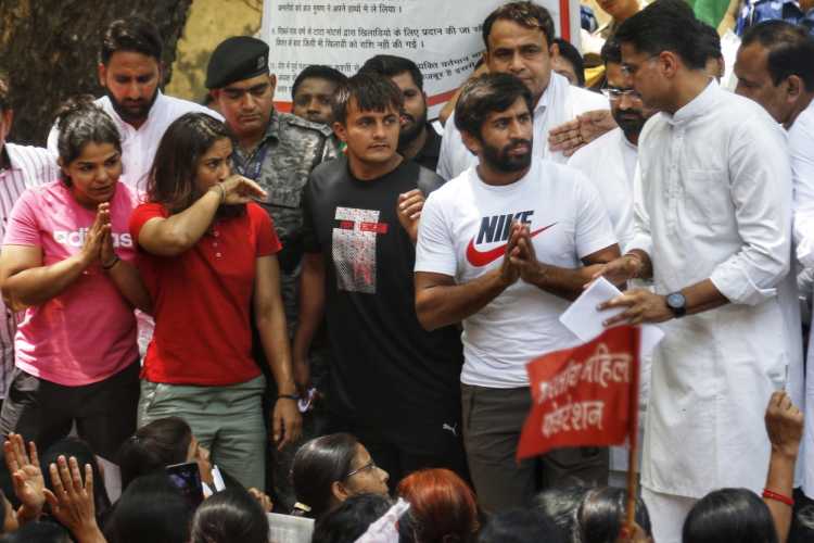 Wrestlers at the protest site