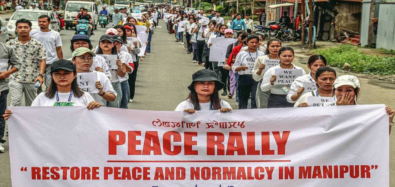 Civil Society members staging protest against violence in Manipur