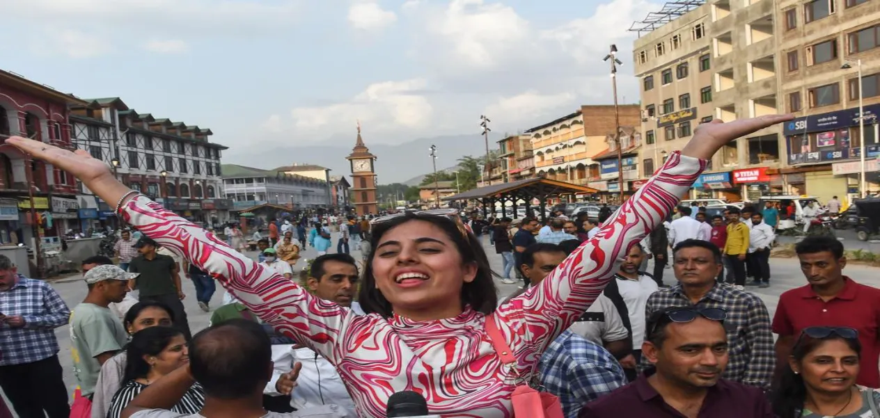 A lady in Kashmir celebrating India's successful moon mission (Photo: Basit Zargar)