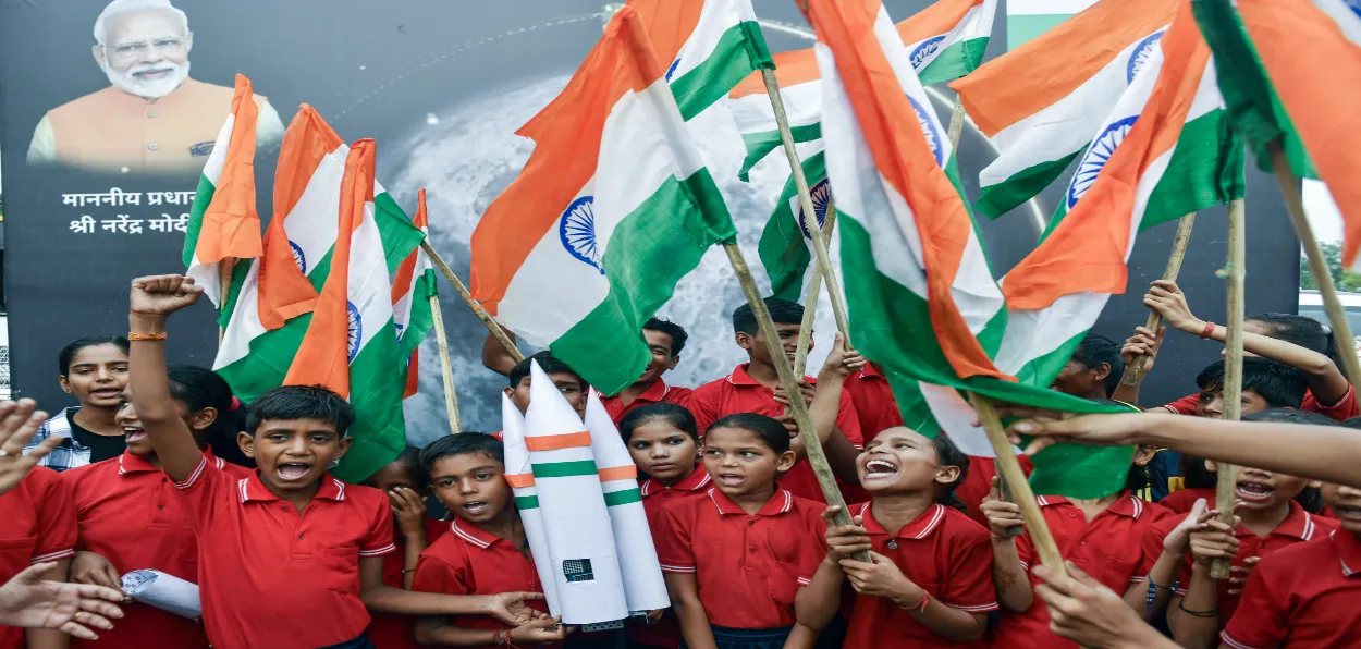 School children celebrating the success of Chandrayaan-3 mission in New Delhi