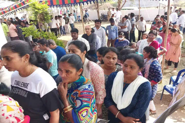 Voters at a polling booth in Telangana