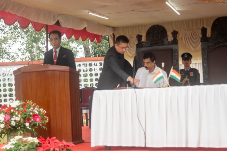 Mizoram Governor Hari Babu Kambhampati adminstering the oath of Office & Secrecy to Pu. Lalduhoma, the new Chief Minister