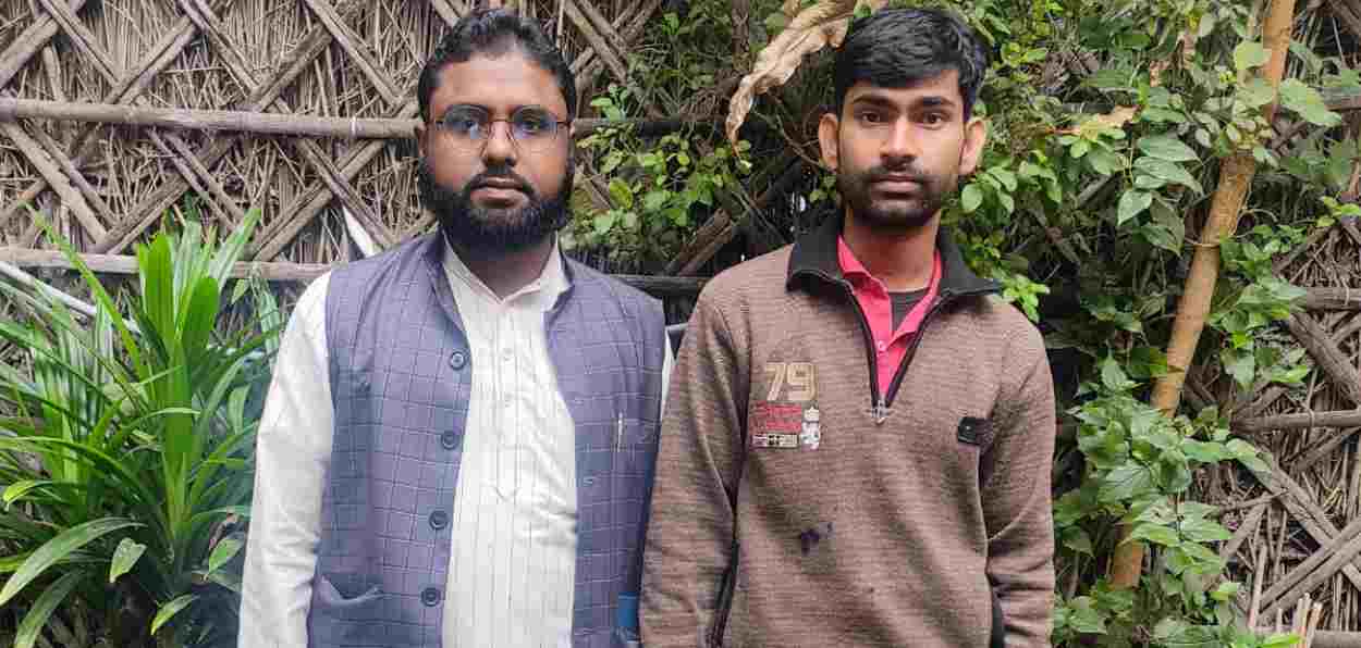 Dr. Shahbaz Alam and goldsmith Kumed Karmakar posing together symbolizing community bond