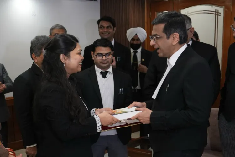 Chief Justice of India DY Chandrachud felicitating Pragya