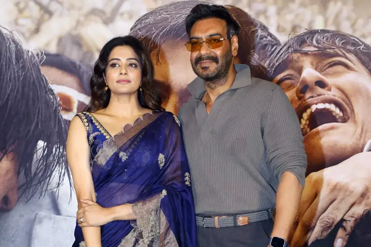  Bollywood actors Ajay Devgn and Priyamani pose for a photo during the trailer launch of their upcoming movie ‘Maidaan’ in Mumbai on Thursday.