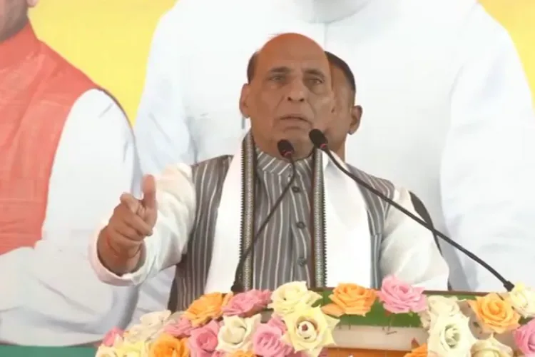 Defence Minister Rajnath Singh addressing a rally in Murshidabad