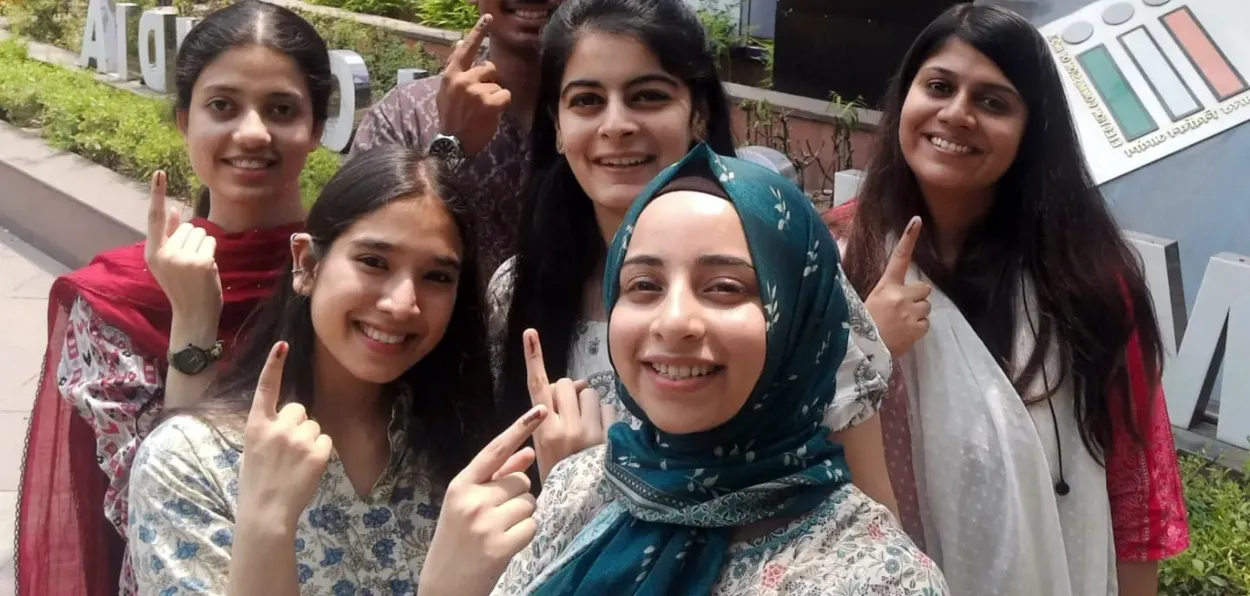 First timer voters displaying their finger marks after casting their vote in Anantnag-Rajouri constituency in Jammu and Kashmir where an all-time high turnout was recorded