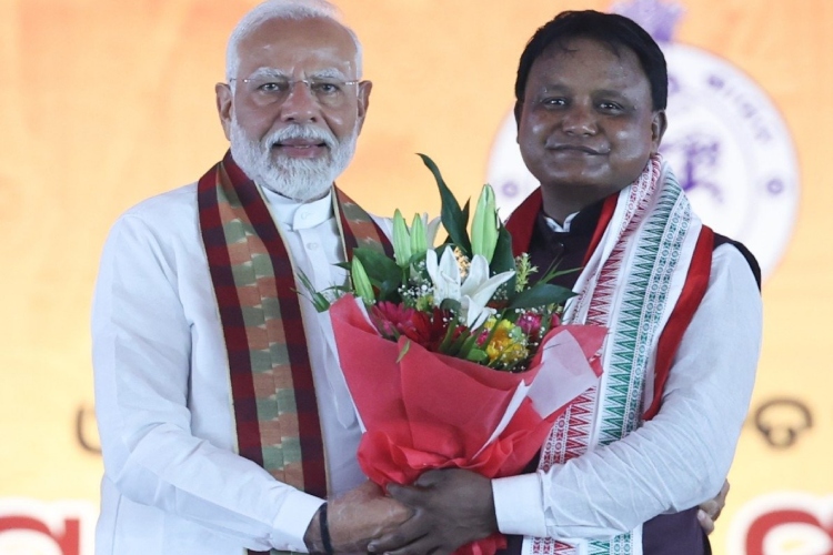 Prime Minister Narendra Modi felicitating the newly sworn in CM of Odisha   Mohan Charan Majhi