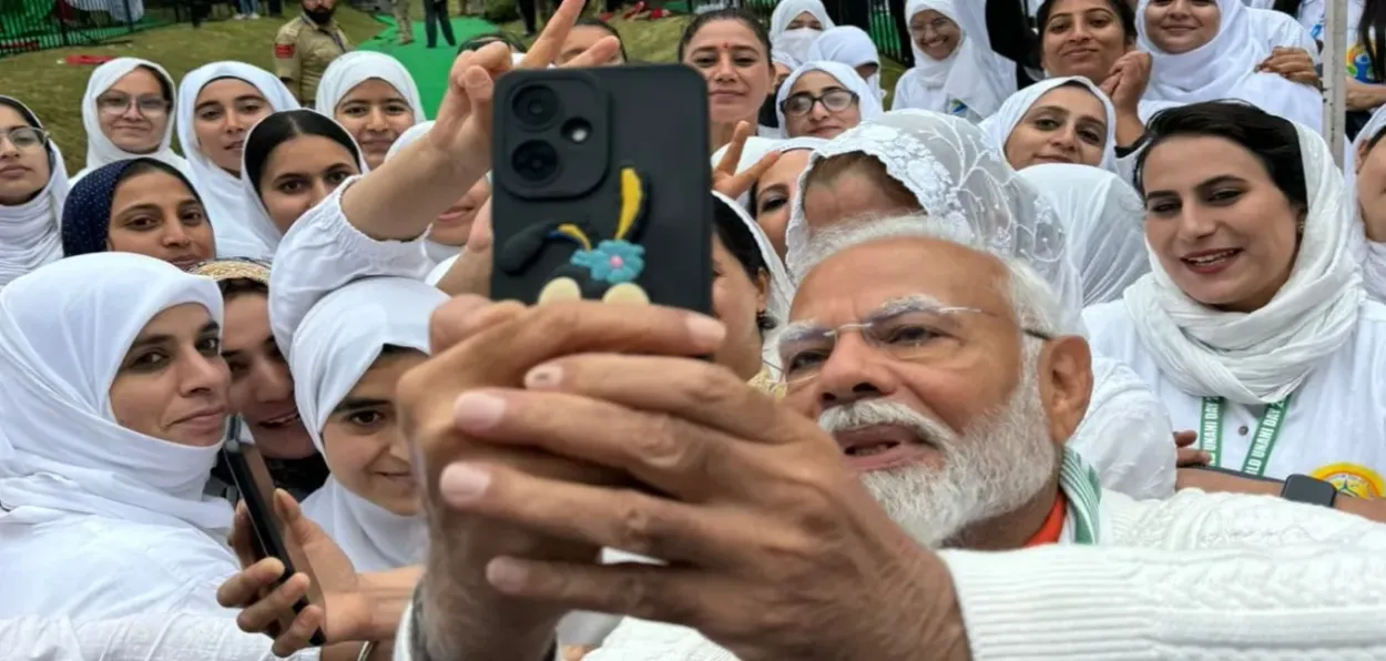 Prime Minister Narendra Modi taking a selfie with Kashmiri youth