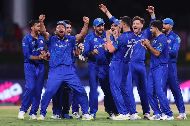 Afghan cricket team celebrating in the field