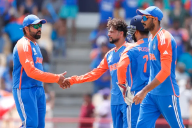 Rohit shaking hands with Arshdeep, Kuldeep during the match