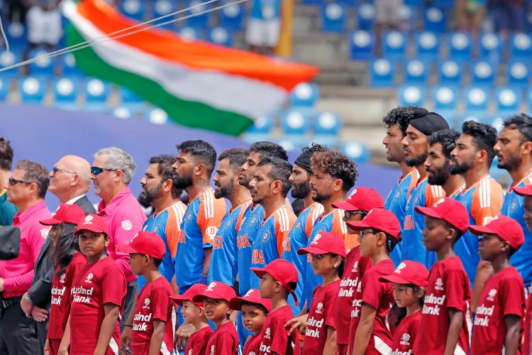 Team India players stand for the national anthem before the T20 finals
