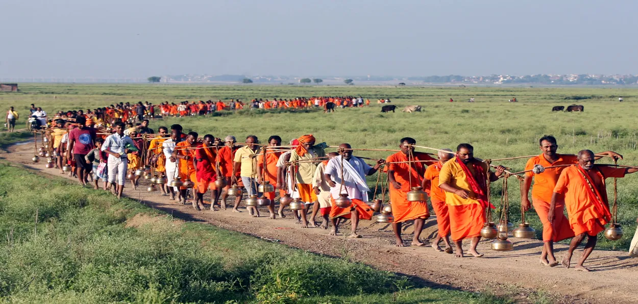 Pilgrims carrying ganga water returning from Pilgrimage in Prayagraj (UP)