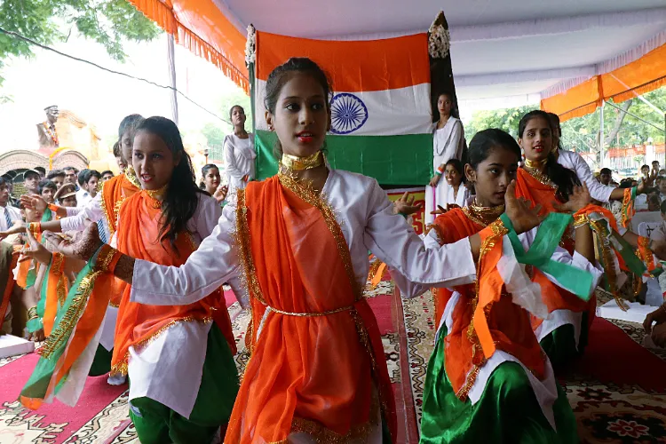School children performing a cultural dance during the celebration of Kargil Vijay Diwas