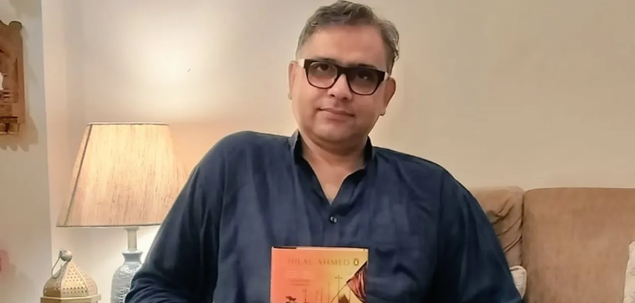 Author Hilal Ahmed with one of his books
