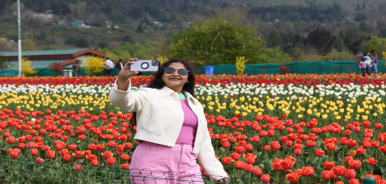 A tourists clicking selfie at the Tulip garden in Srinagar