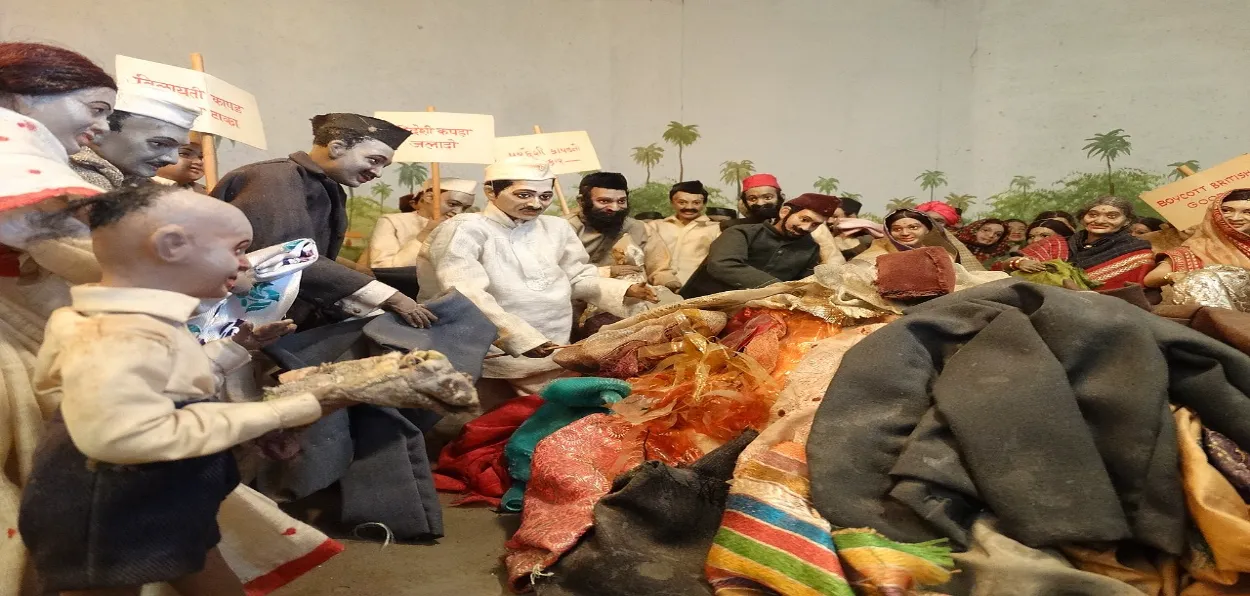 A diorama of Mahatma Gandhi leading satyagrahis in burning British clothes at Gandhi Smriti, New Delhi