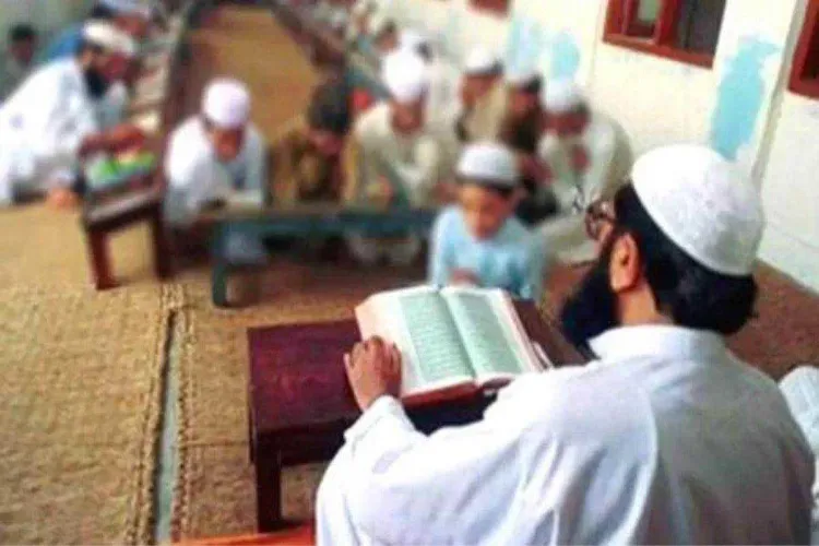 A Maulvi teaching in a Madrassa in MP