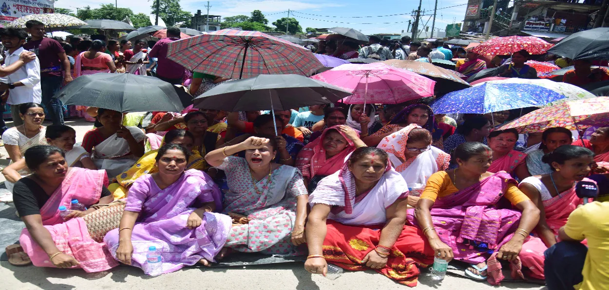 Locals stage a protest against the alleged gang rape of a 14-year-old minor girl in Dhing area of Nagaon in Central Assam