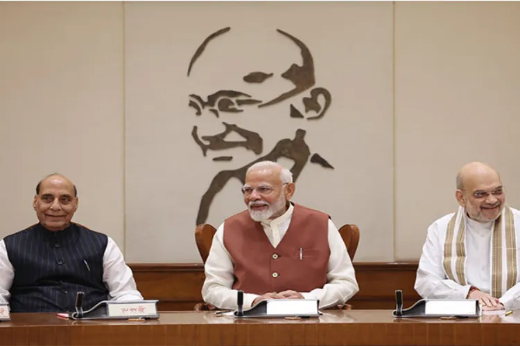 Defence Minister Rajnath Singh, Prime Minister Narendra Modi and Home Minister Amit Shah (L-R)