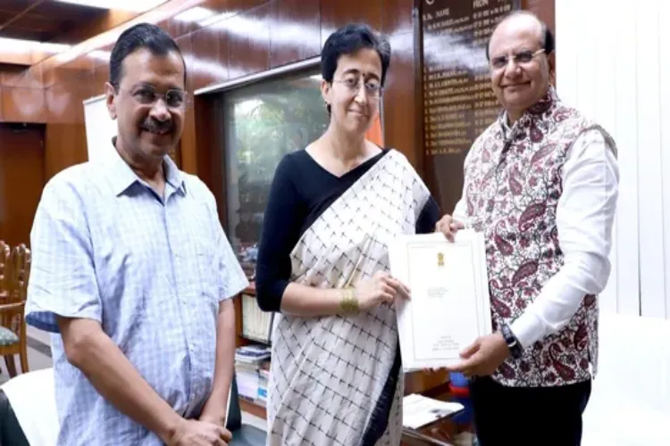 Arvind Kejriwal with Delhi LG Vinai Kumar Saxena and Atishi 