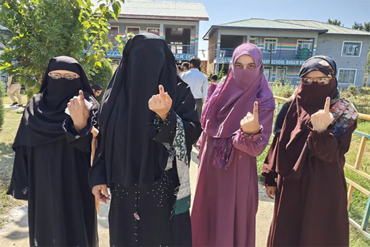 Voters outside a polling station after casting votes