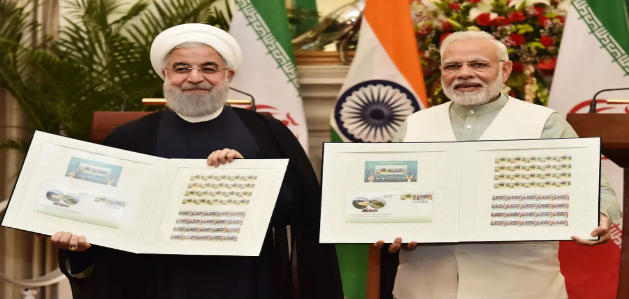 Prime Minister Narendra Modi and the late Iranian president Ebrahim Riasi signing a deal on Chabahar port in New Delhi si