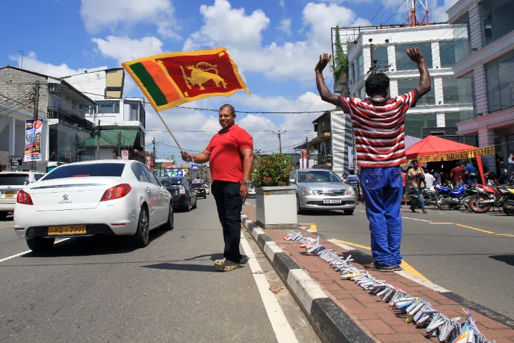 A Sri Lankan on the streets of Colombo with the flag