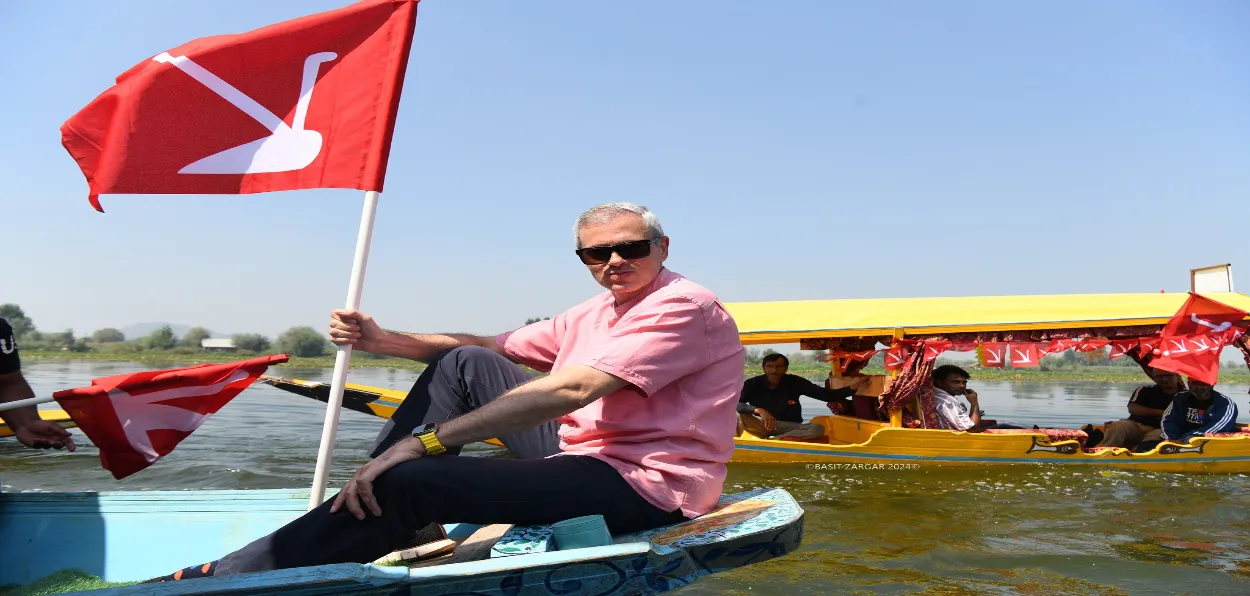 National Conference leader Omar Abdullah leading a boat rally in Dal Lake (Basit Zargar)