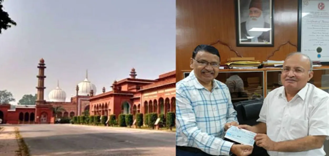 Prof Suhail sabir handing over the cheque of Rs 50 lakhs to the AMU official