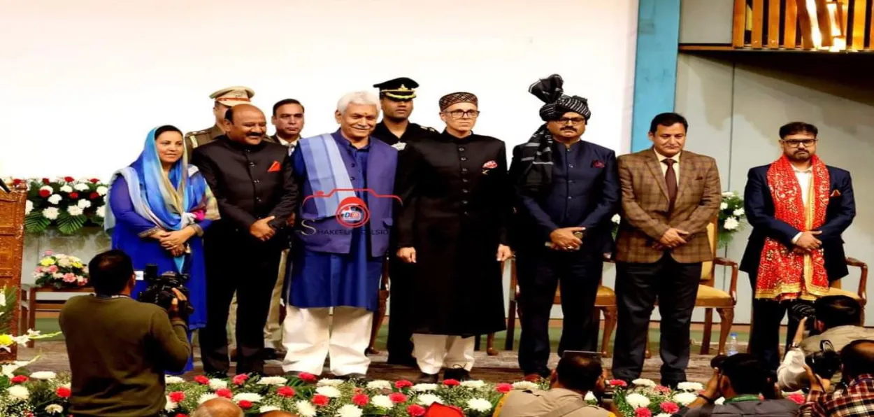 Omar Abdullah with Lt Governor Manoj Singh and five minister after taking oath