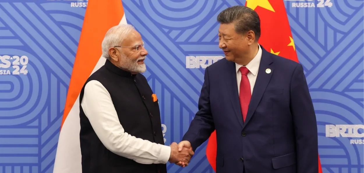 Prime Minister Narendra Modi meeting Chinese president Xi Jinping at Kazan Russia (X)imir Putin (X)