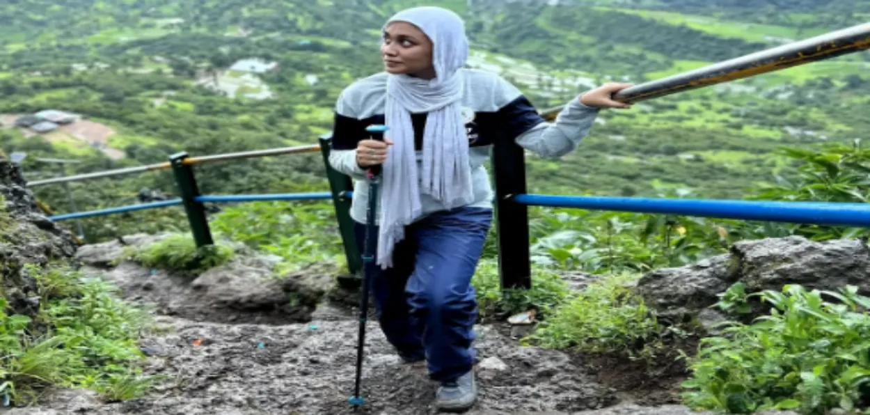 Haaequa Awati alias Hijabi trekker  climbing Kalsubhi peak, the highest one in Maharashtra