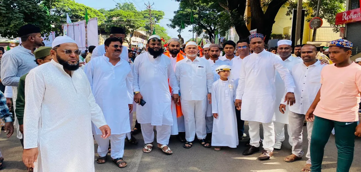 Idris Naikwadi celebrating Eid (Fourth from left, wearing a white skull cap)