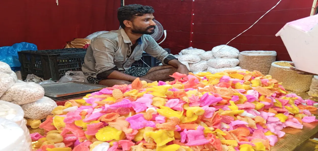 Toys made of sugar being sold by a roadside vendor in Asansol, West Bengal