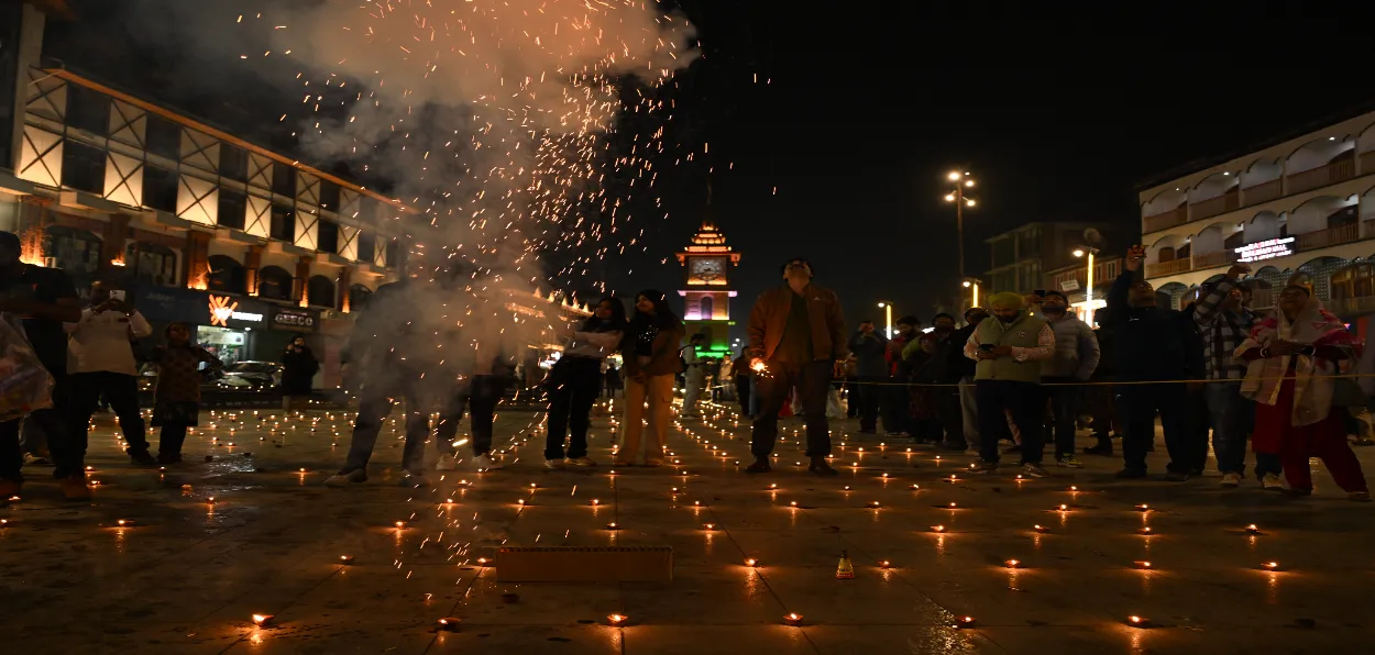 Clock Tower in the backdrop as Lal Chowk lights up on Diwali evening in Srinagar