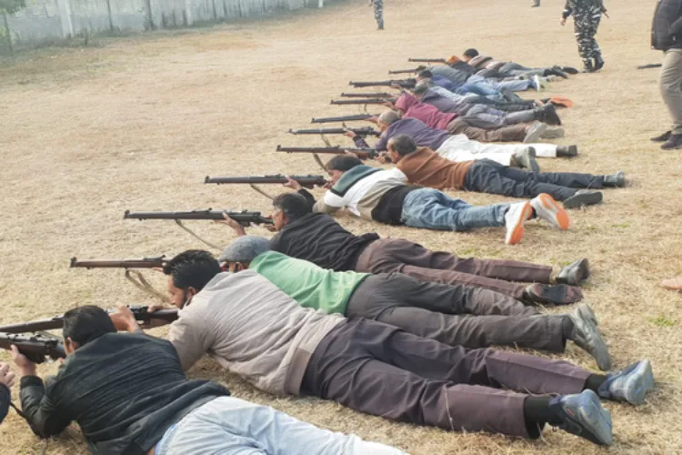 Village defence Guards practising shooting