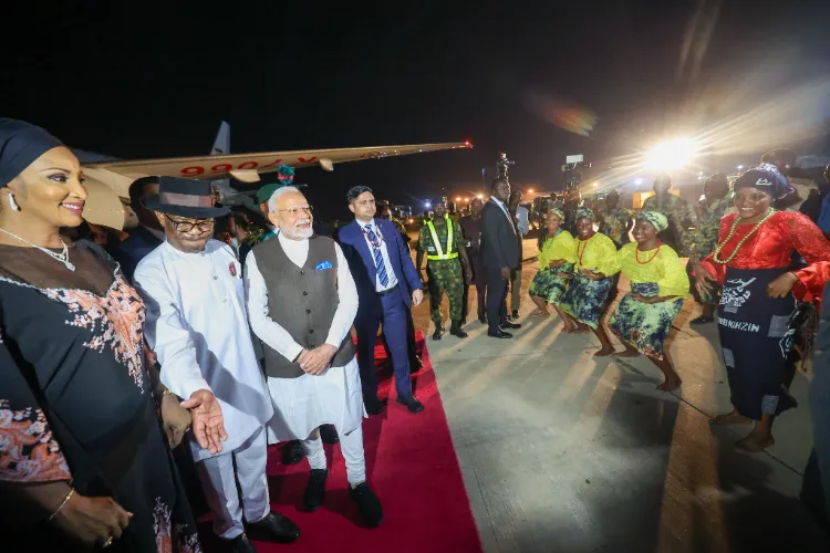 President of Nigeria Bola Ahmed Tinubu and his wife receive PM Narendra Modi at airport