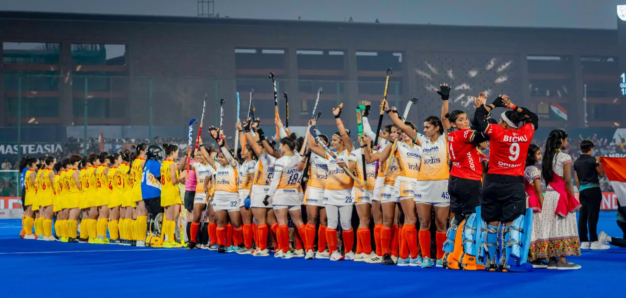 Indian team with the runners up China after lifting the title of Hockey Asian Champions