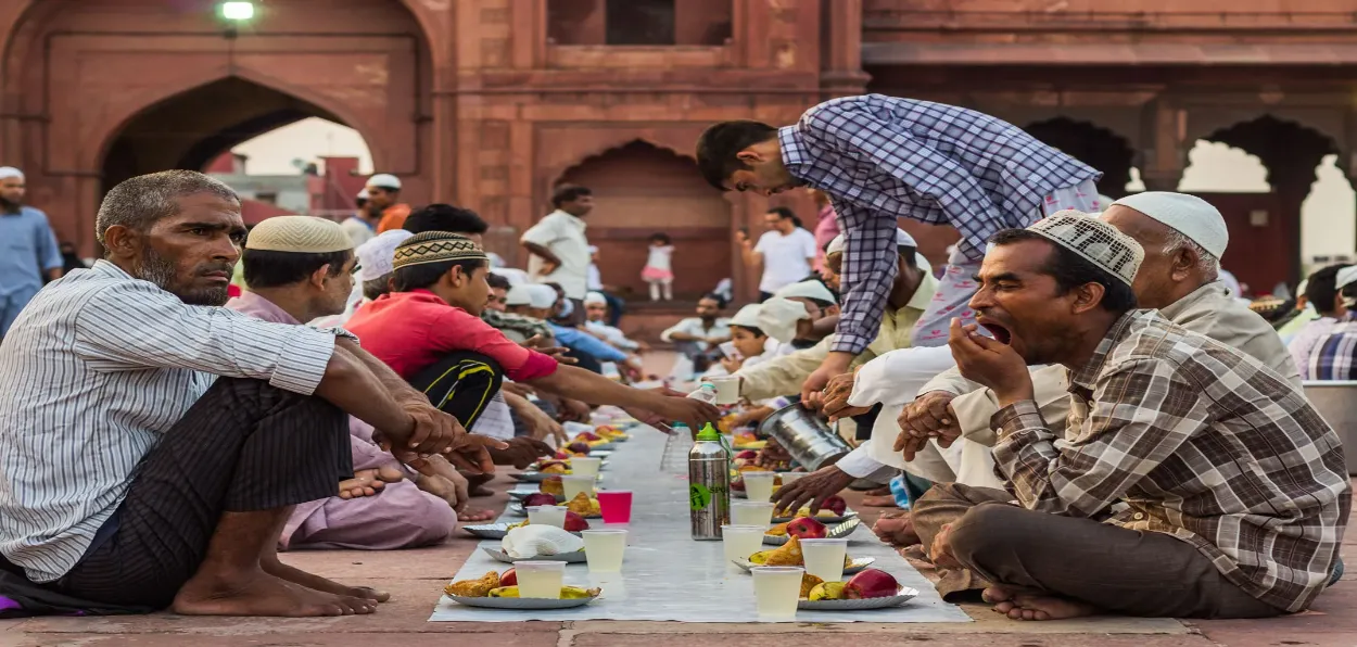 Muslims breaking their fast in  Delhi's Jama Masjid during Ramzan