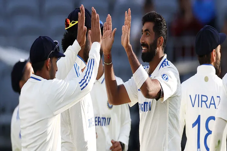 Jasprit Bumrah with team mates after he taking the fourth wicket