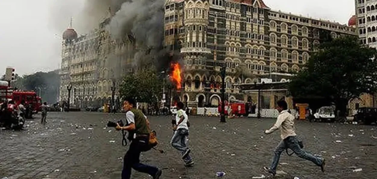 The never-to fade image of journalist running around as Hotel Taj Mahal is set on fire by the holed in terrorists in Mumbai on 26/11 (File Photo)