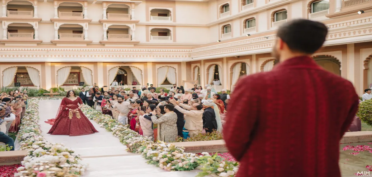 A bride entering venue of a destination wedding