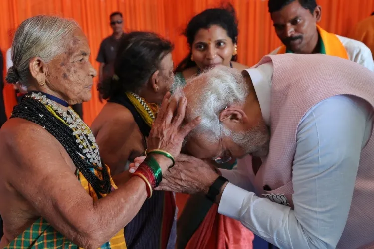 Prime Minister Narendra Modi seeks blessings from Tulsi Gowda