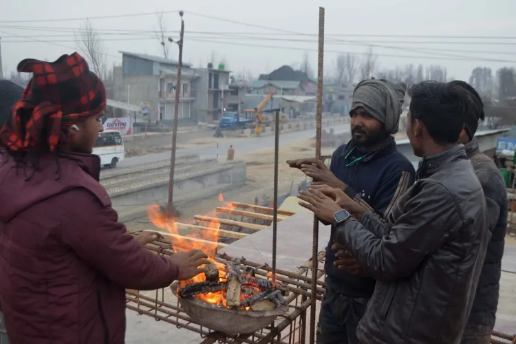 Construction workers warming up in Srinagar